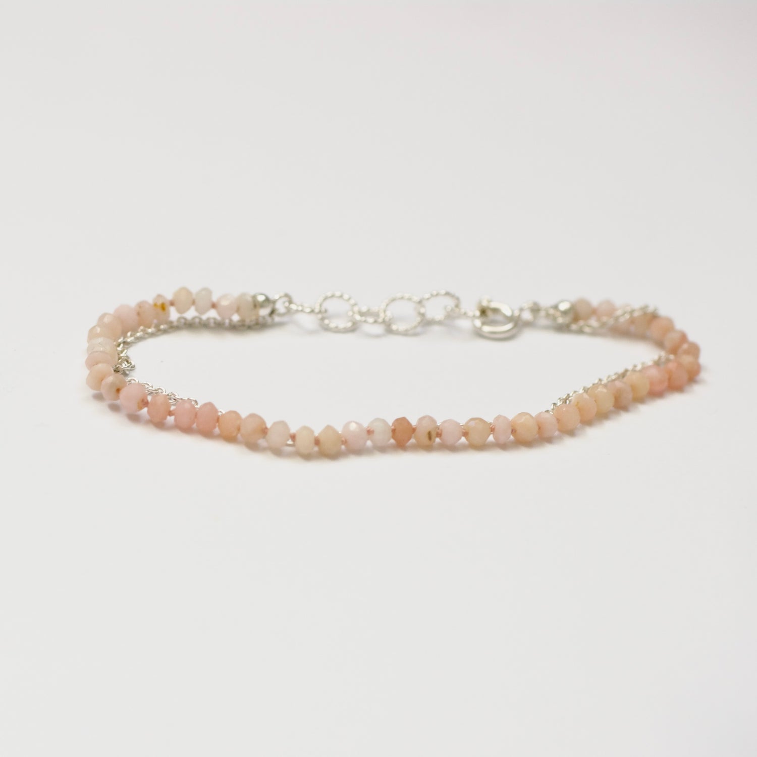 Onyx Armband — Roze onyx Geknoopt op Strengetje met Zilver