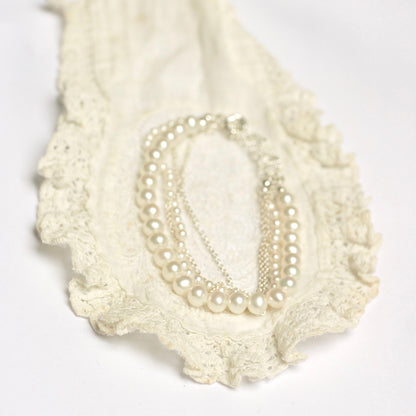 Zilveren armband met witte parels - Hester Zagt
